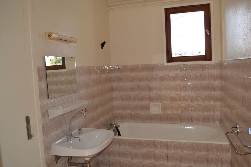 Appartement Rez de chaussée, proche centre village. Jardin