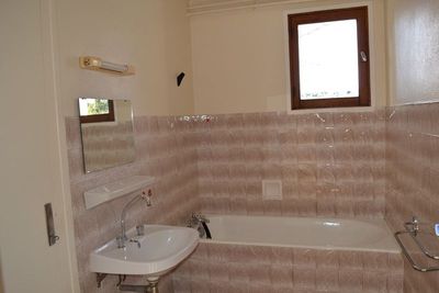 Appartement Rez de chaussée, proche centre village. Jardin