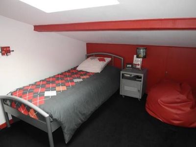 Chambre à l'étage mansardée