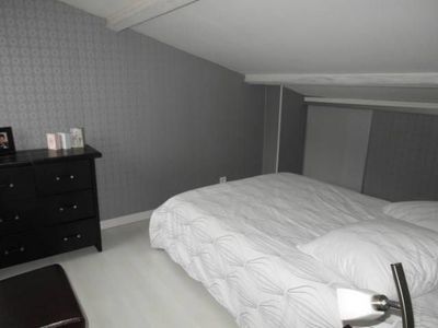 Chambre à l'étage mansardée